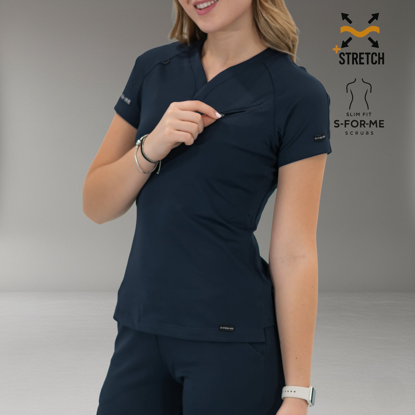 Detail view of women’s navy blue 905 scrub top fabric and neckline