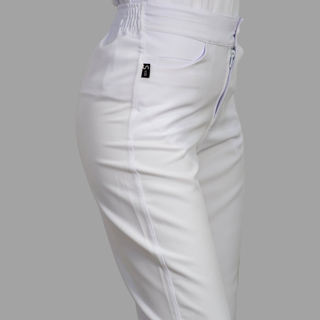Women's white Alviero stretch scrub pants — additional angle showing fabric and silhouette