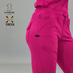 Front close-up of fuchsia Style 905 jogger scrub pants, drawstring waist and zippered pocket