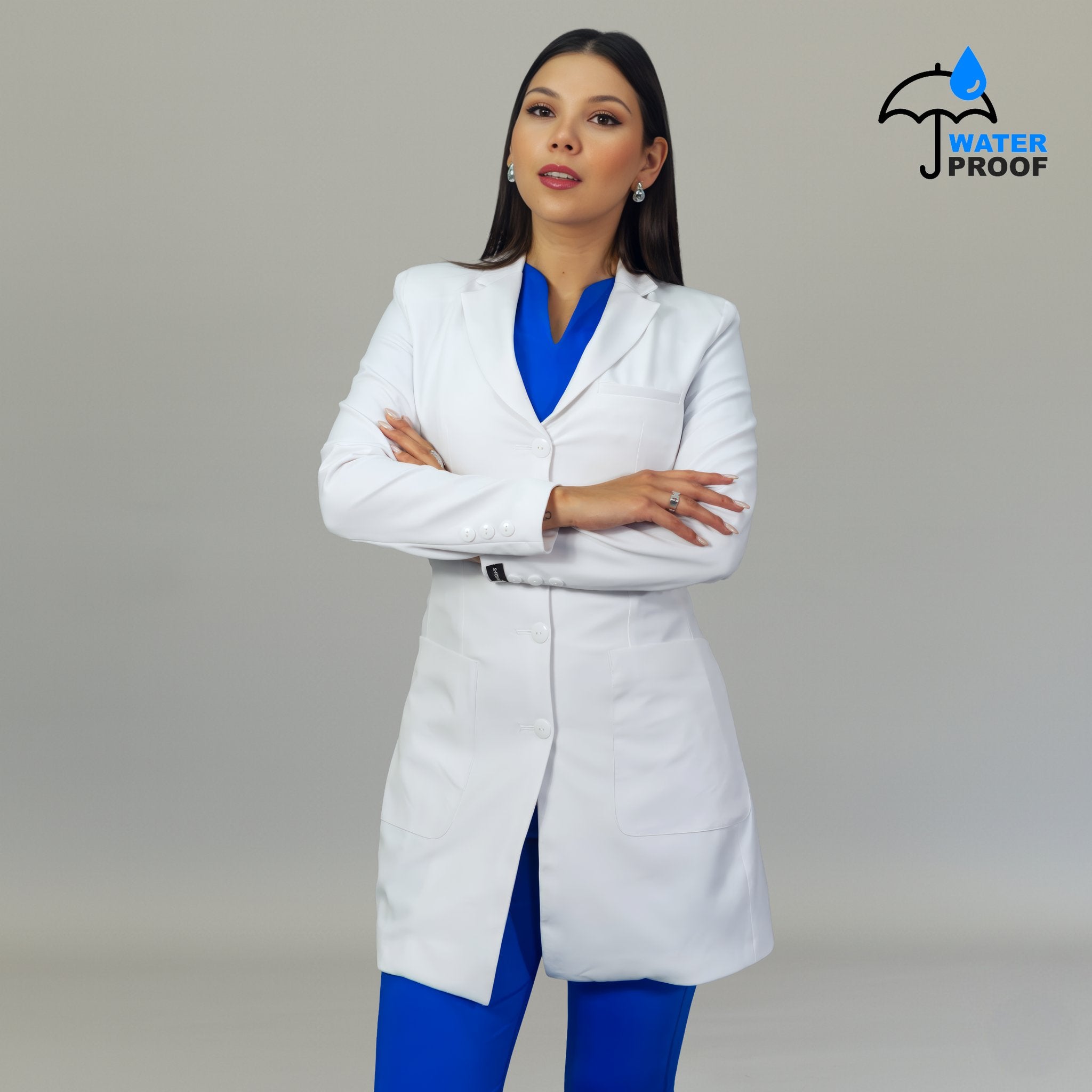 Women’s contoured white lab coat front view with pockets and waterproof finish