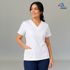 Full body view of women's 502 white scrub set walking pose — lightweight fluid-resistant medical uniform S-FOR-ME