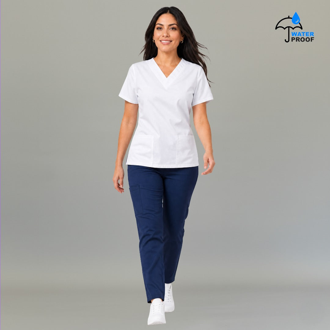 Women's white 502 scrub top with hand in front pocket — lightweight fluid-resistant nursing top S-FOR-ME