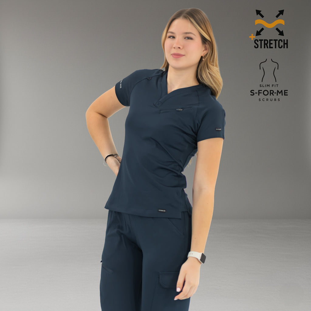 Women’s navy blue slim fit scrub top front pose with matching pants