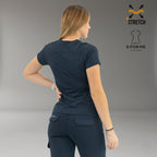 Back view of women’s navy blue scrub top with tailored slim fit