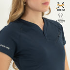 Close-up of women’s navy blue 905 scrub top with V-neck and sleeve detail