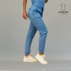 Side view of women’s ceil blue jogger scrub pants with elastic waist and cargo pocket