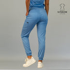 Women’s ceil blue scrub jogger pants back view with rear pockets and ankle cuffs
