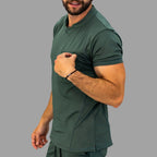 Side view of men's olive green super stretch scrub top