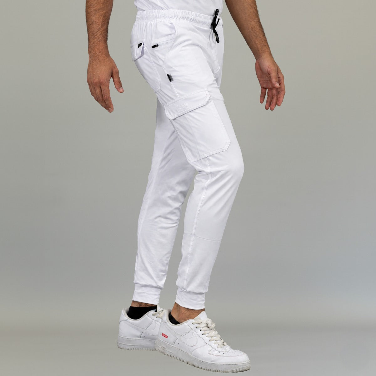 Men’s white clinical uniform scrub jogger pants front pose