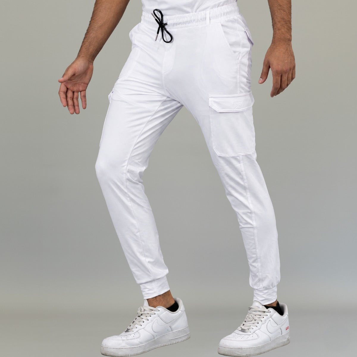Men’s white scrub jogger pants showing athletic ankle cuffs