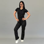 Full-length front view of women’s Black scrub jumpsuit