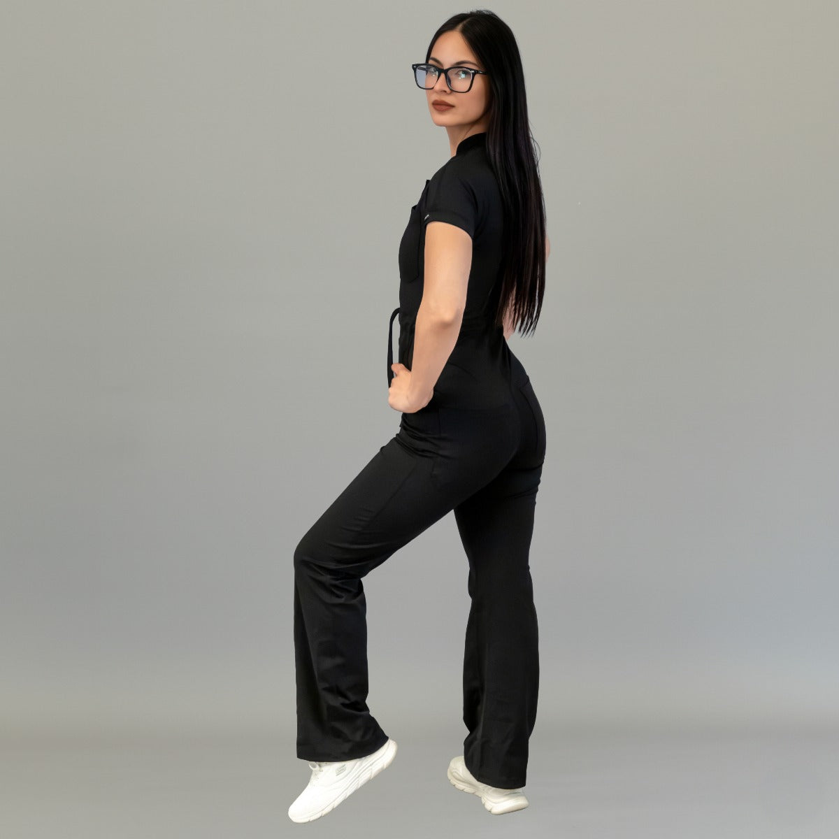 Rear three-quarter view of women’s Black scrub jumpsuit