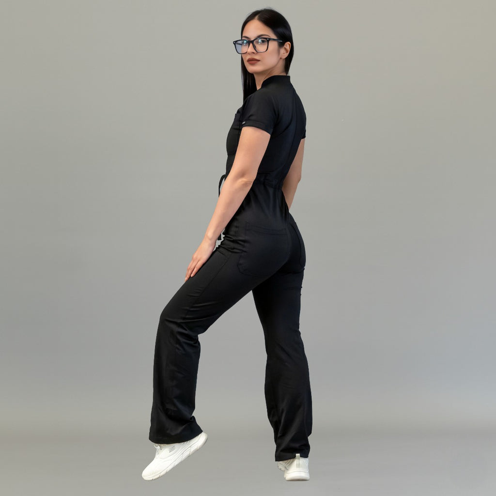 Three-quarter back view of women’s Black Super Stretch scrub jumpsuit