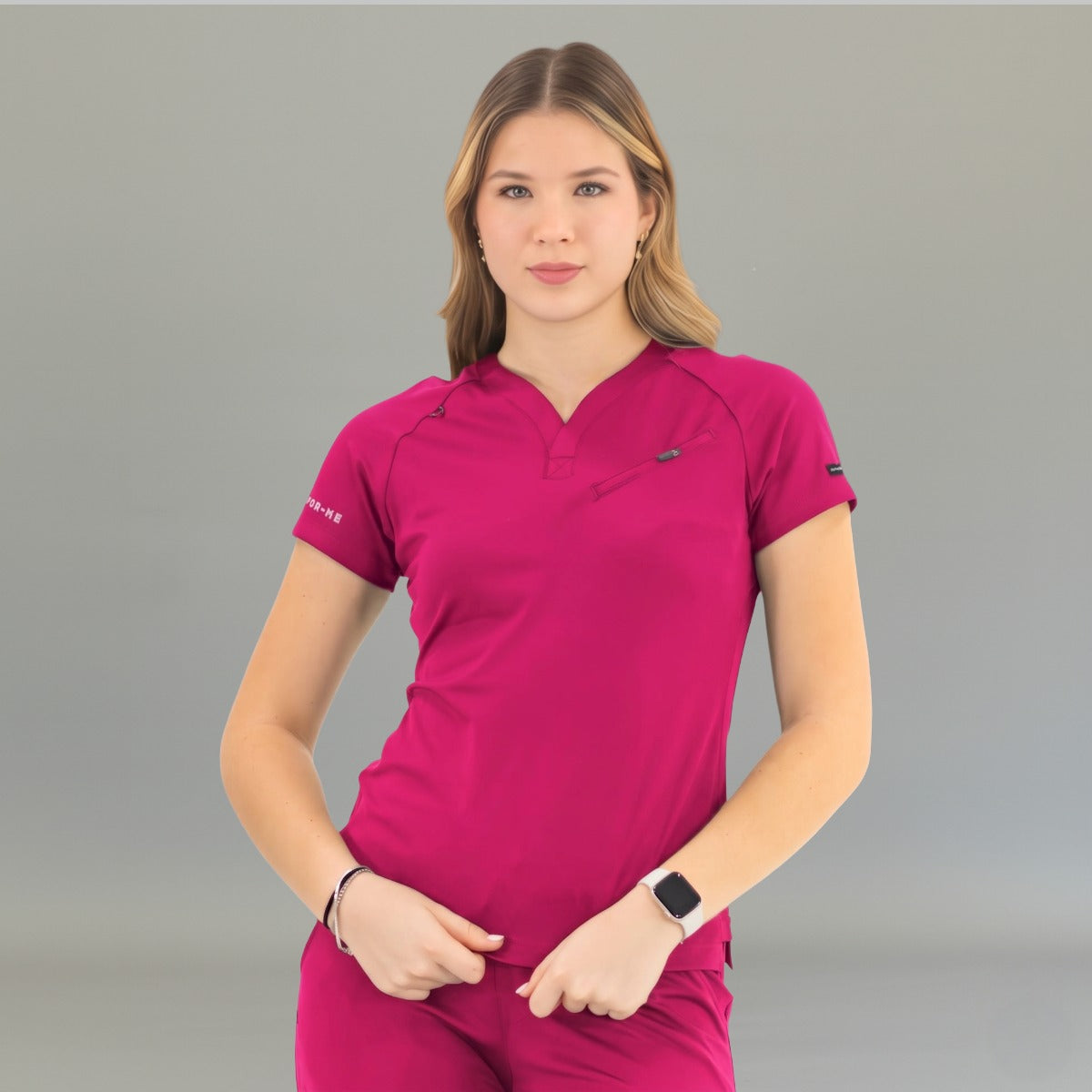 Women's Style 905 fuchsia V-neck scrub top, front view with zippered chest pocket