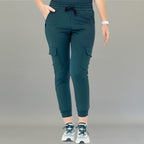Women’s Pants 910 Airforce Blue super stretch scrub pants front view with cargo pockets and jogger cuffs
