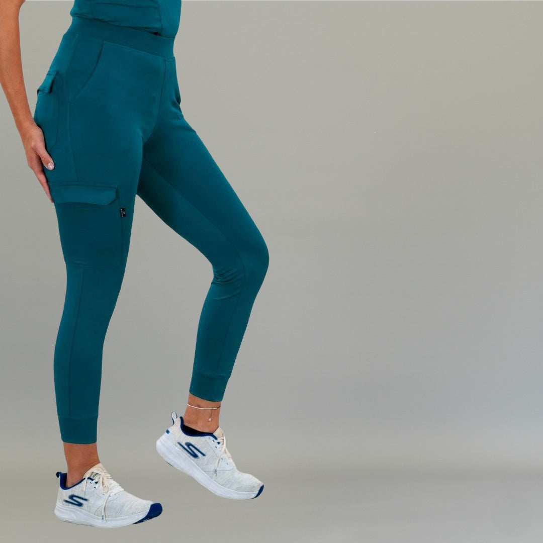 Side view of the 901 corsair blue scrub jogger pants showing the cargo pocket design.
