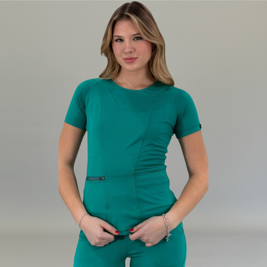 Front view of a women's surgical green super stretch scrub top, half length.