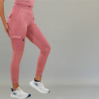 Rosewood scrub jogger 901 side view with cargo pocket detail and white sneakers.