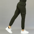 Back-side angle showing olive green women's jogger pants 910 with one leg extended backward.