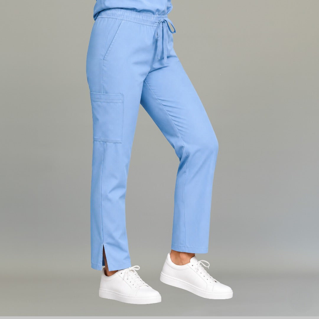 Side view of women's 502 sky blue scrub pants showing cargo pocket detail — lightweight fluid-resistant nursing pants by S-FOR-ME