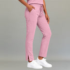 Vista lateral del pantalón médico palo de rosa claro 502 para mujer mostrando el ajuste en pierna.