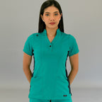 Side view of Women's 930 Teal Green/Navy slim fit healthcare scrub top