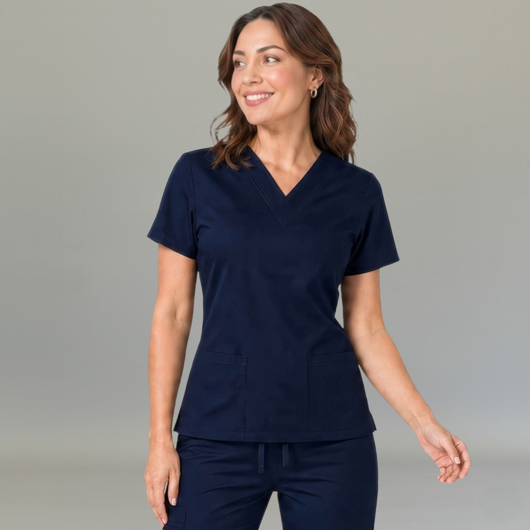 Women's navy blue lightweight scrub top 502 with V-neck crossover and patch pockets — S-FOR-ME fluid-resistant medical uniform