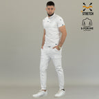 Side full-body view of men’s white 901 scrub top and scrub pants