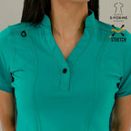 Lifestyle view of Women's 930 Teal Green/Navy Super Stretch scrub top by S-FORME