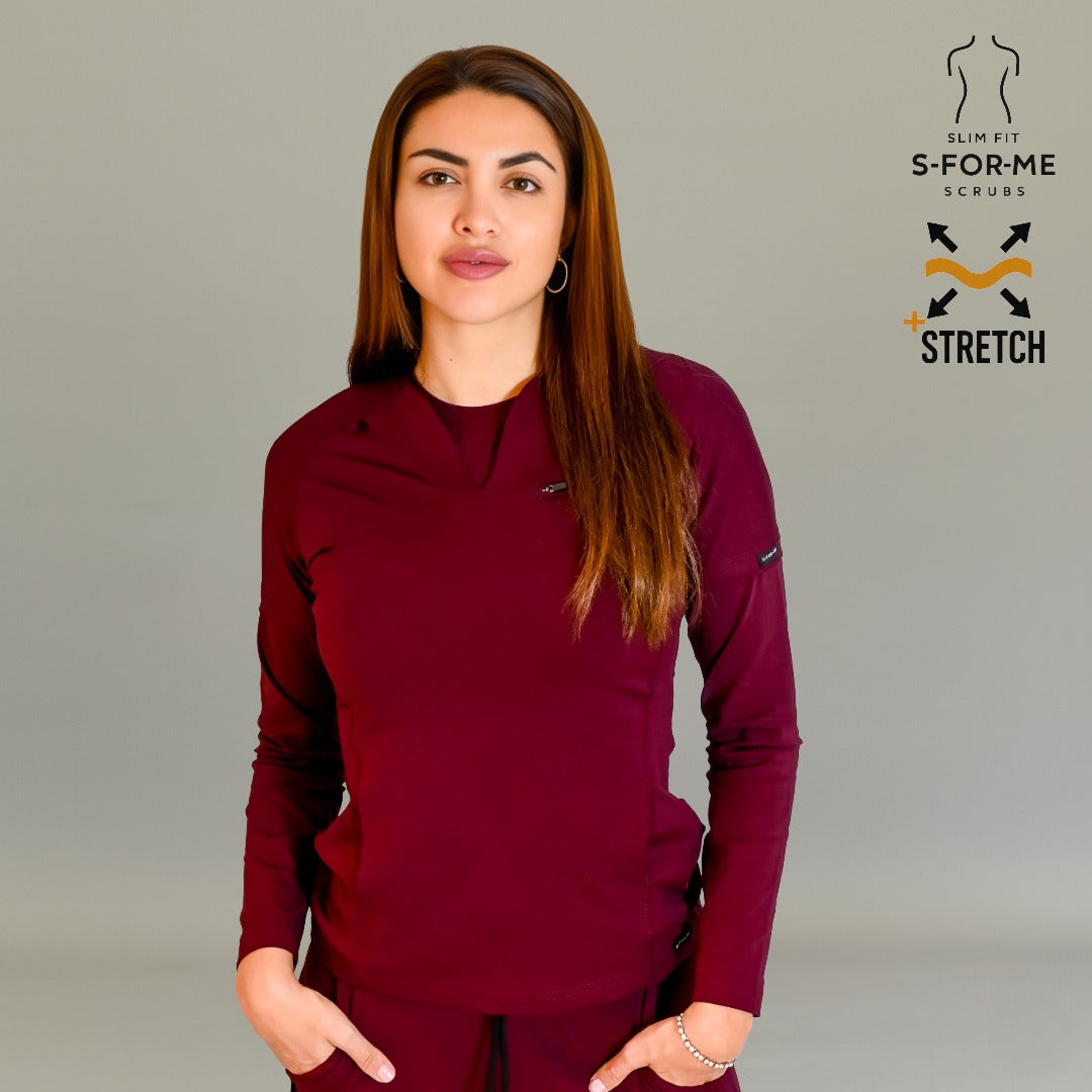 Maroon women’s medical scrub top with chest pocket, raglan sleeves and flexible Super Stretch fabric