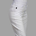Women's white Alviero stretch scrub pants — additional angle showing fabric and silhouette