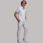 Mens Alviero white fluid-resistant zip scrub top worn with matching scrubs - SFORME